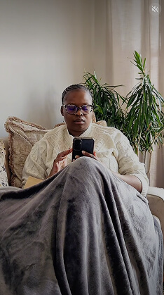 Customer sharing the GOTyme Bank rebrand from home
