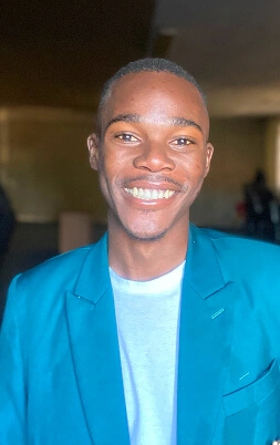 Smiling man blue blazer portrait