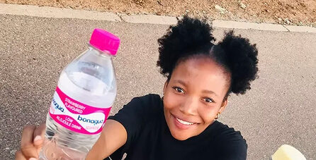 South African creator holding a product during a Q4 campaign