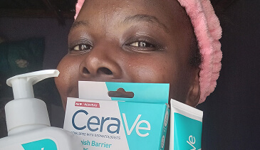 Consumer holding CeraVe products