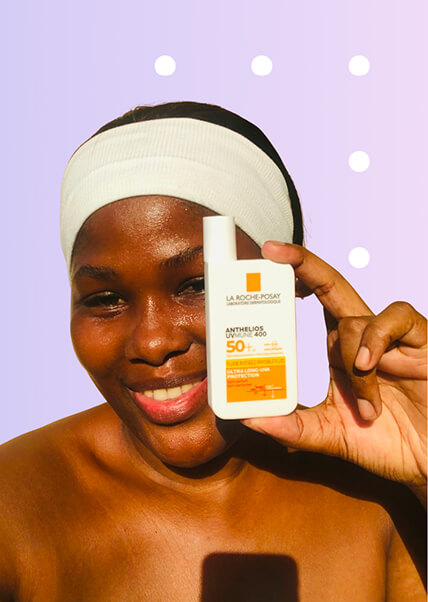 Creator holding sunscreen