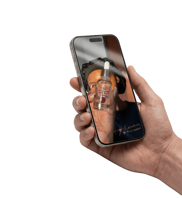 Hand holding a phone with user-generated content